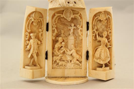A 19th century Dieppe carved ivory triptych figure, 8in.
